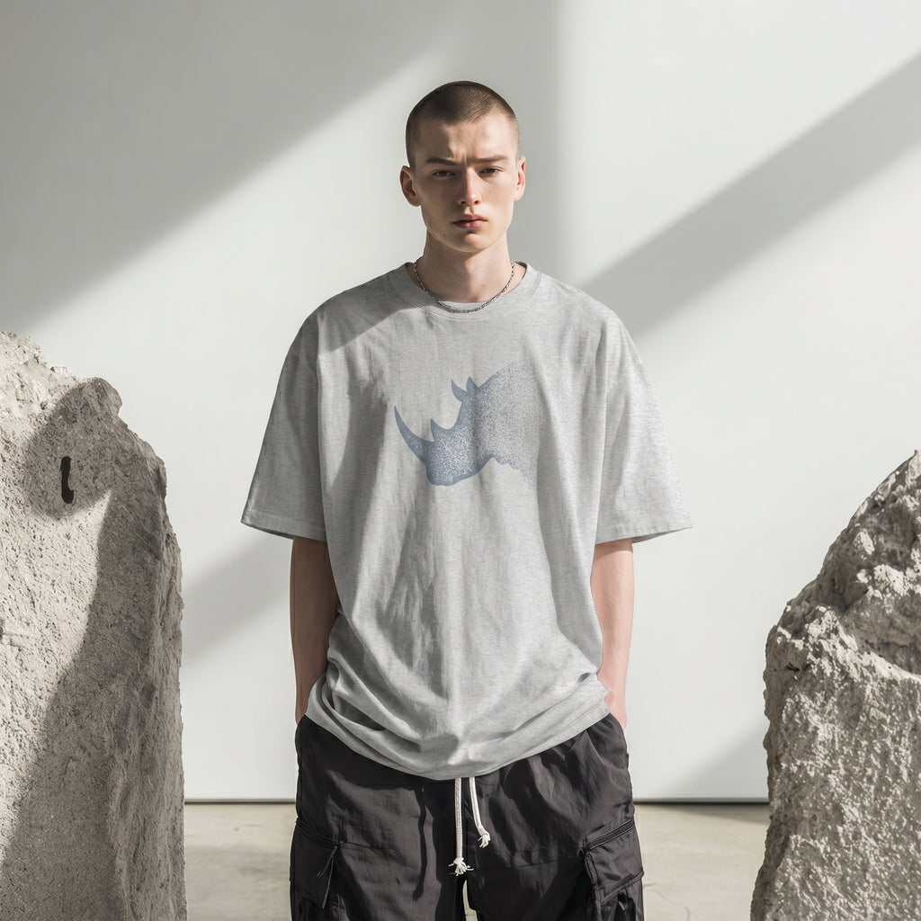 Dissolving Rhinoceros T-Shirt – Minimalist Wildlife Graphic Inspired by Presence and Endurance