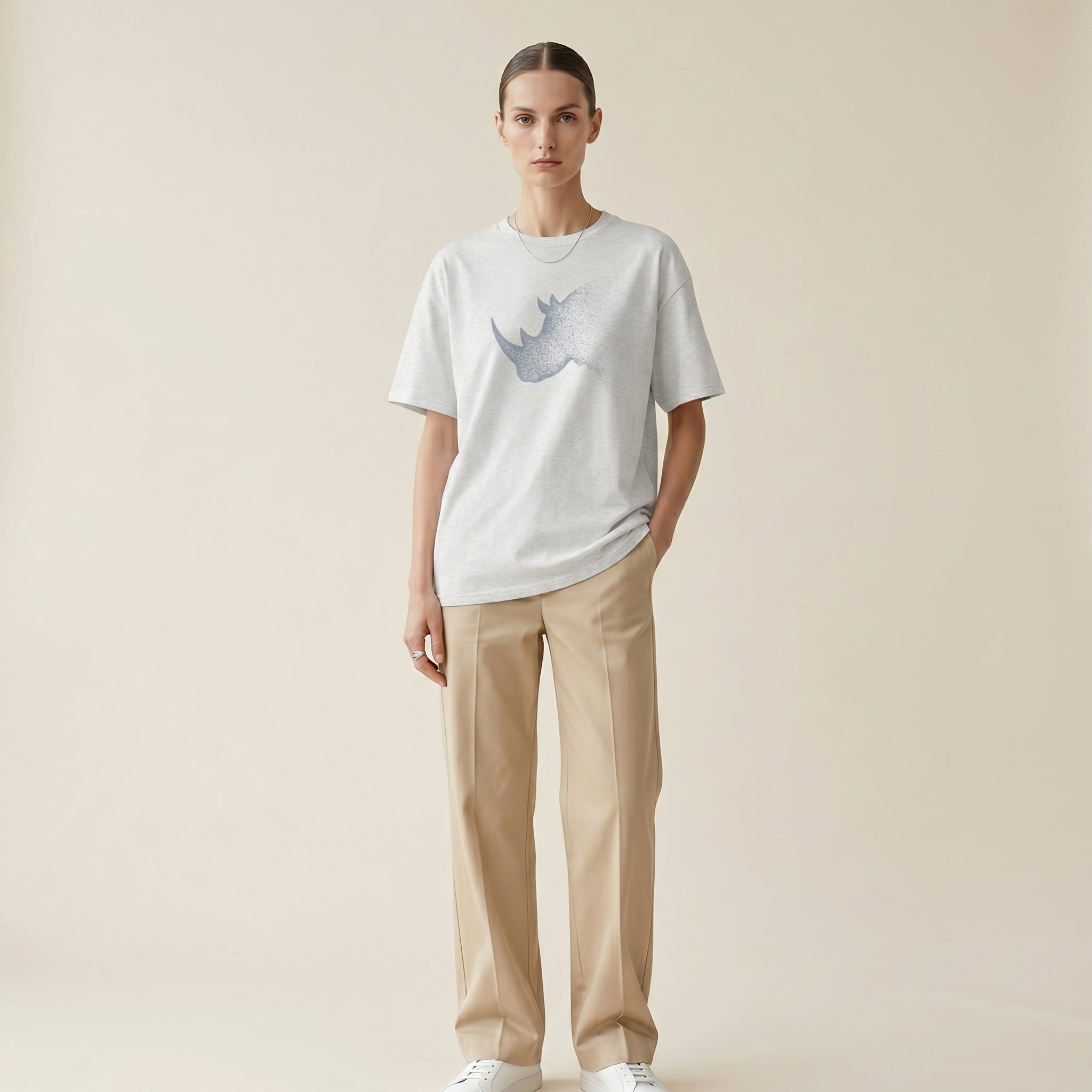 Dissolving Rhinoceros T-Shirt – Minimalist Wildlife Graphic Inspired by Presence and Endurance